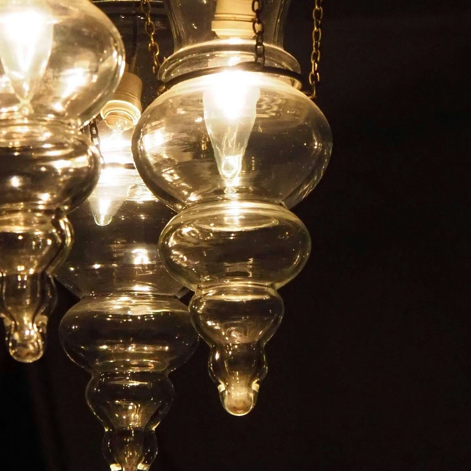 Close-up of a glass chandelier highlighting its elegant design