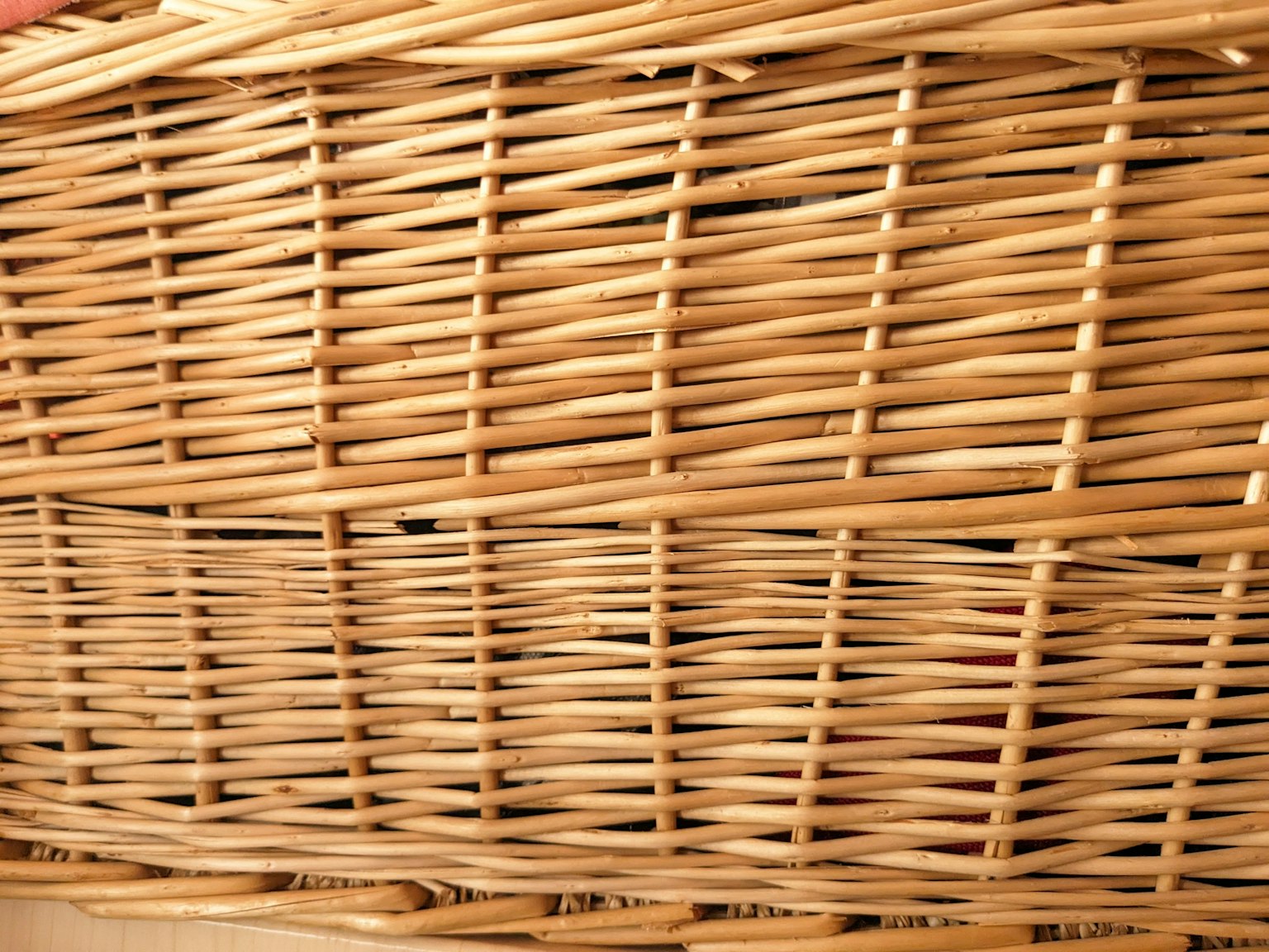 Image of the side of a woven basket with intricate patterns