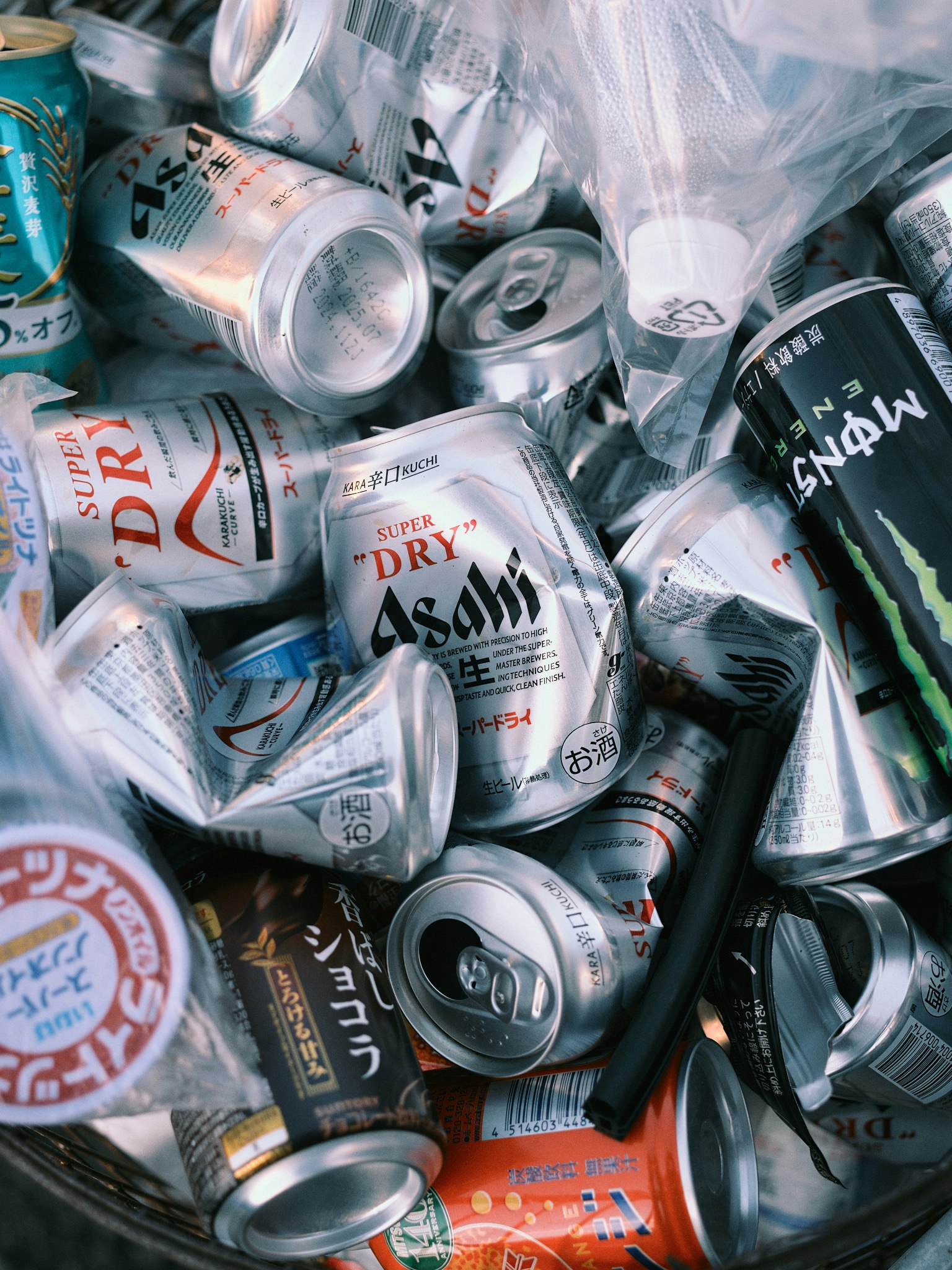 cans of soft drinks piled together