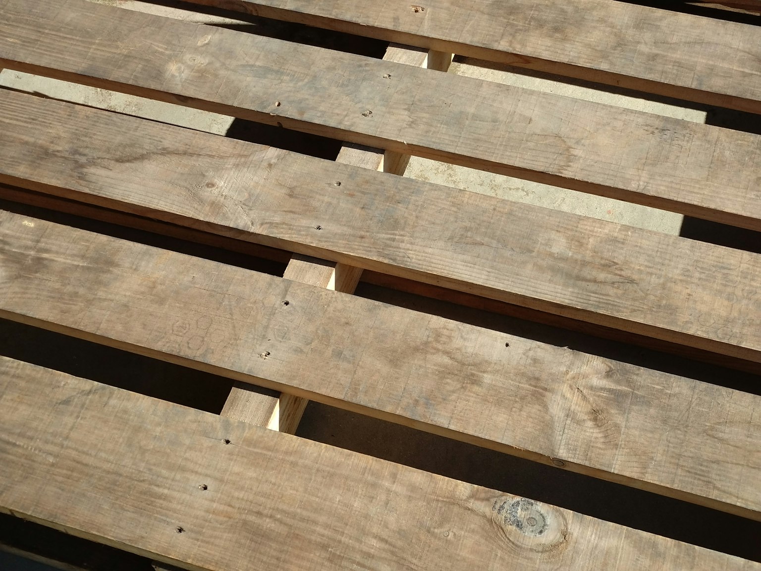 Close-up of a wooden pallet surface
