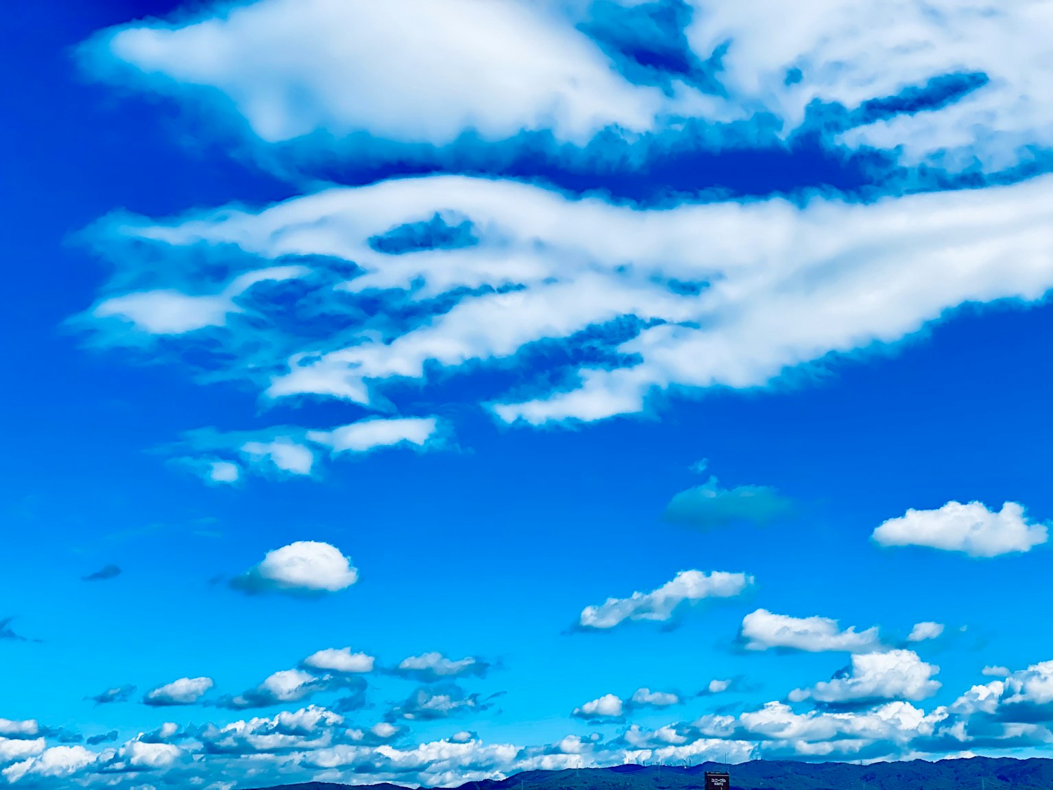 Beautiful landscape with white clouds in a blue sky