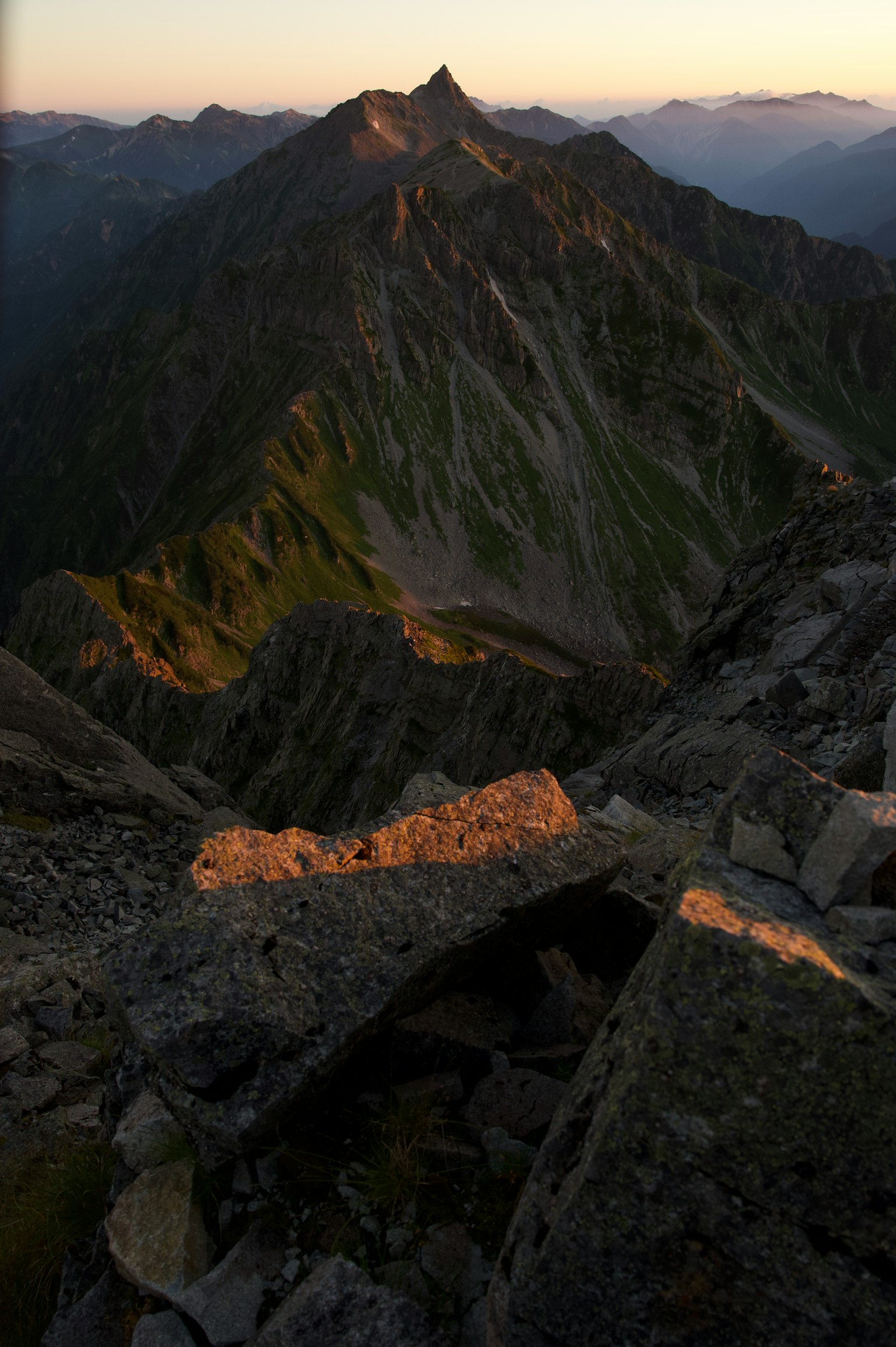 Stunning mountain landscape with sunlight illuminating the peak